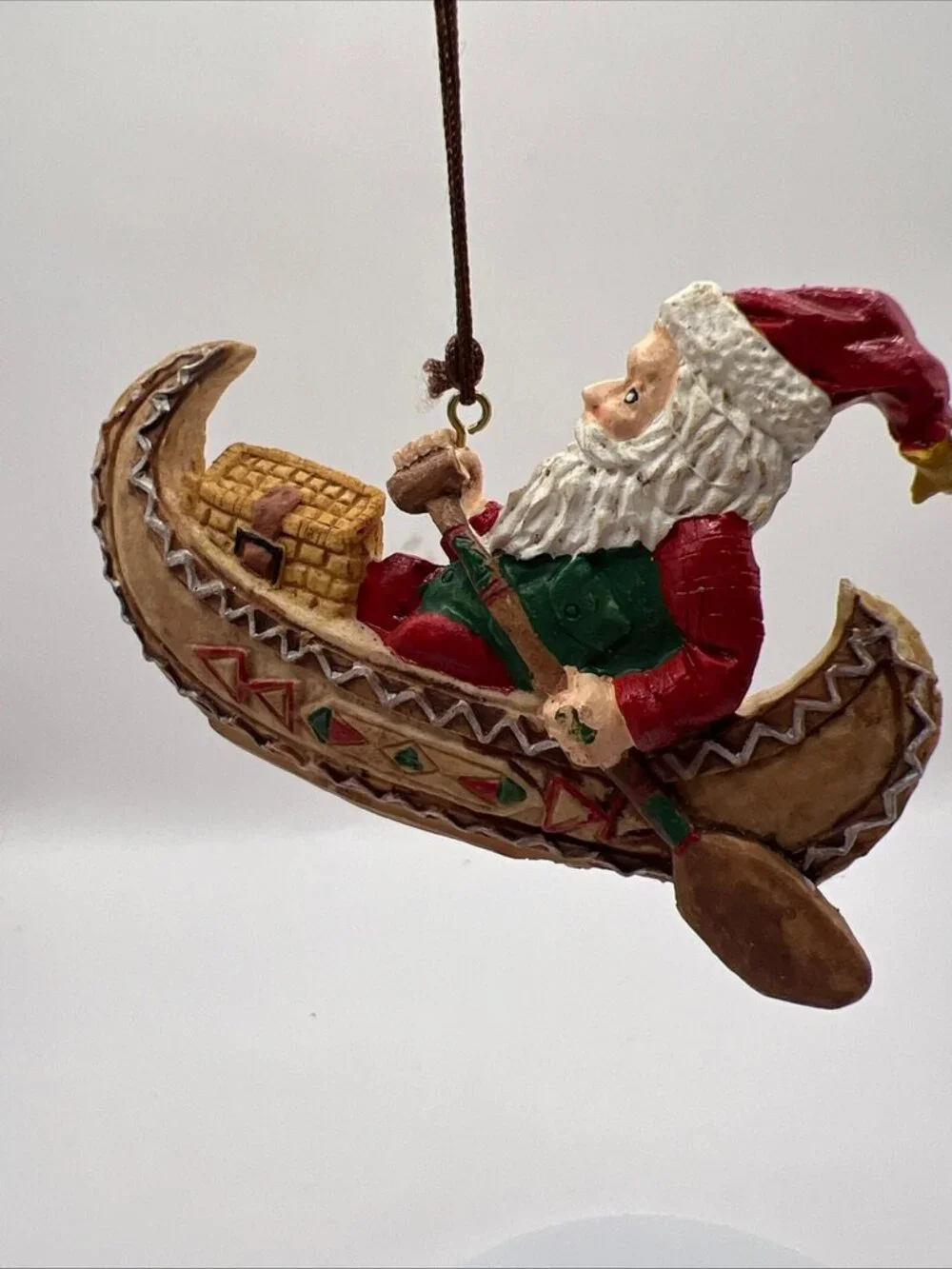 Vtg Santa Paddling His Canoe Folk Art Christmas Ornament 2x3.5”